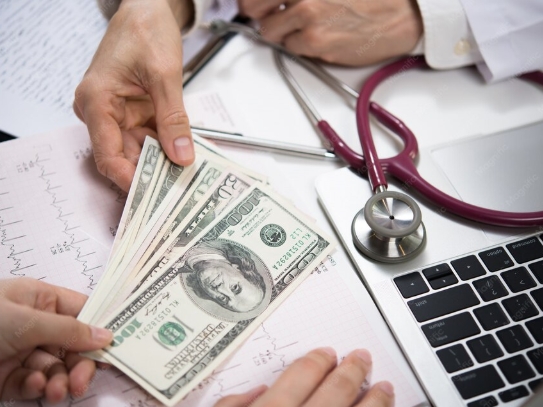 Picture of a patient hanging a doctor money